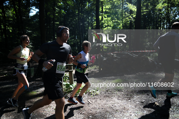 Competitors run during the 17th PKO Three Mounds Run on Pilsudski Mound in Krakow, Poland, on September 22, 2024. The Three Mounds Run has b...