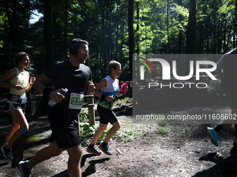 Competitors run during the 17th PKO Three Mounds Run on Pilsudski Mound in Krakow, Poland, on September 22, 2024. The Three Mounds Run has b...