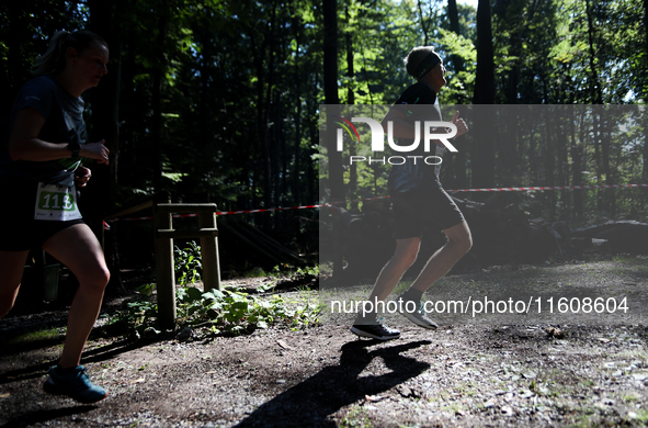 Competitors run during the 17th PKO Three Mounds Run on Pilsudski Mound in Krakow, Poland, on September 22, 2024. The Three Mounds Run has b...