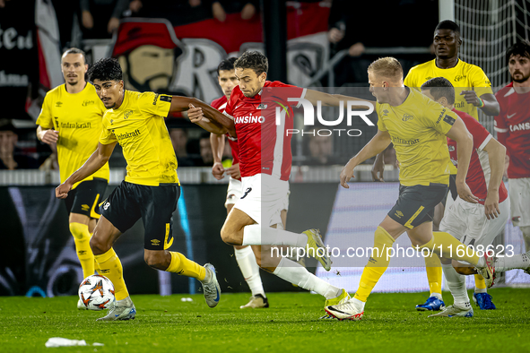 Elfsborg midfielder Ahmed Qasem and AZ Alkmaar midfielder Zico Buurmeester play during the match AZ - Elfsborg at the AZ Stadium for the UEF...