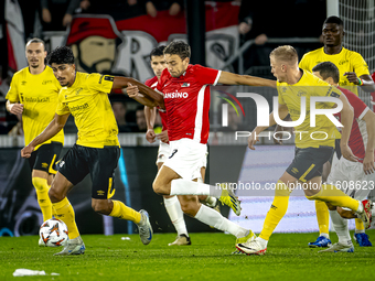 Elfsborg midfielder Ahmed Qasem and AZ Alkmaar midfielder Zico Buurmeester play during the match AZ - Elfsborg at the AZ Stadium for the UEF...