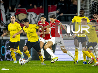 Elfsborg midfielder Ahmed Qasem and AZ Alkmaar midfielder Zico Buurmeester play during the match AZ - Elfsborg at the AZ Stadium for the UEF...