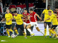 Elfsborg midfielder Ahmed Qasem and AZ Alkmaar midfielder Zico Buurmeester play during the match AZ - Elfsborg at the AZ Stadium for the UEF...