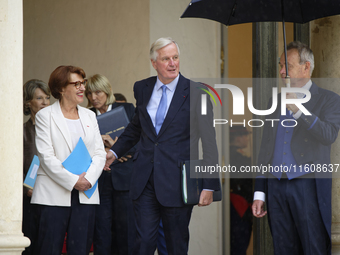 Newly appointed French Minister for Agriculture, Food Sovereignty, and Forestry Annie Genevard (L) and French Prime Minister Michel Barnier...