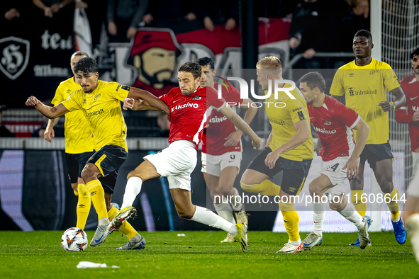 Elfsborg midfielder Ahmed Qasem and AZ Alkmaar midfielder Zico Buurmeester play during the match AZ - Elfsborg at the AZ Stadium for the UEF...