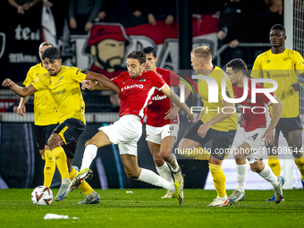 Elfsborg midfielder Ahmed Qasem and AZ Alkmaar midfielder Zico Buurmeester play during the match AZ - Elfsborg at the AZ Stadium for the UEF...