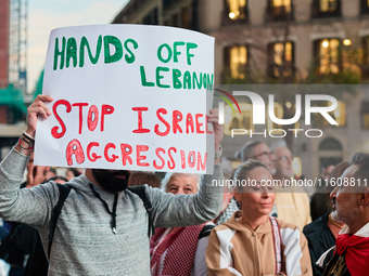 A demonstration in solidarity with Lebanon takes place in Plaza de Callao in Madrid, Spain, on September 25, 2024. (