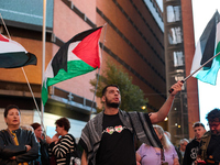 A demonstration in solidarity with Lebanon takes place in Plaza de Callao in Madrid, Spain, on September 25, 2024. (