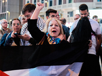 A demonstration in solidarity with Lebanon takes place in Plaza de Callao in Madrid, Spain, on September 25, 2024. (