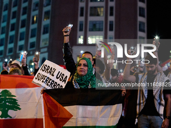 A demonstration in solidarity with Lebanon takes place in Plaza de Callao in Madrid, Spain, on September 25, 2024. (