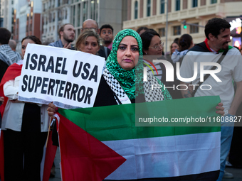 A demonstration in solidarity with Lebanon takes place in Plaza de Callao in Madrid, Spain, on September 25, 2024. (