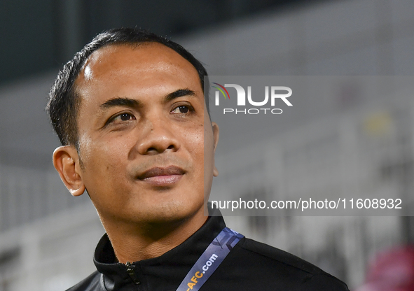 Fadzuhasny Juraimi, Head Coach of Singapore, looks on before the 2025 AFC U20 Asian Cup Qualifiers Group J match between Qatar and Singapore...