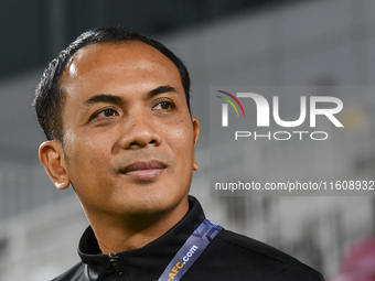 Fadzuhasny Juraimi, Head Coach of Singapore, looks on before the 2025 AFC U20 Asian Cup Qualifiers Group J match between Qatar and Singapore...