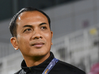 Fadzuhasny Juraimi, Head Coach of Singapore, looks on before the 2025 AFC U20 Asian Cup Qualifiers Group J match between Qatar and Singapore...