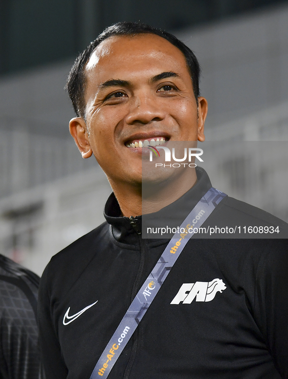 Fadzuhasny Juraimi, Head Coach of Singapore, looks on before the 2025 AFC U20 Asian Cup Qualifiers Group J match between Qatar and Singapore...