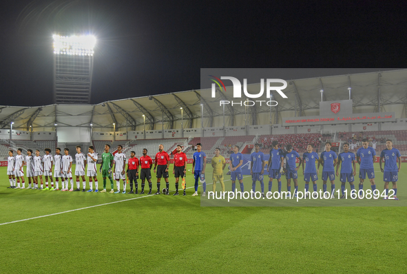 Players from Qatar and Singapore line up before the 2025 AFC U20 Asian Cup Qualifiers Group J match between Qatar and Singapore at Abdullah...