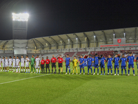 Players from Qatar and Singapore line up before the 2025 AFC U20 Asian Cup Qualifiers Group J match between Qatar and Singapore at Abdullah...