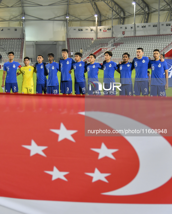 Players from Singapore line up before the 2025 AFC U20 Asian Cup Qualifiers Group J match between Qatar and Singapore at Abdullah bin Khalif...