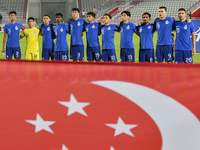 Players from Singapore line up before the 2025 AFC U20 Asian Cup Qualifiers Group J match between Qatar and Singapore at Abdullah bin Khalif...