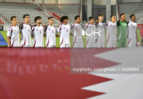 Players from Qatar line up before the 2025 AFC U20 Asian Cup Qualifiers Group J match between Qatar and Singapore at Abdullah bin Khalifa St...