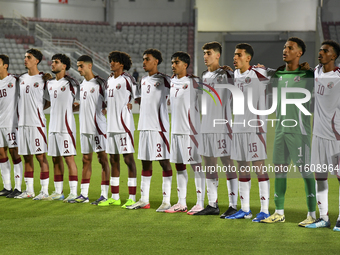 Players from Qatar line up before the 2025 AFC U20 Asian Cup Qualifiers Group J match between Qatar and Singapore at Abdullah bin Khalifa St...