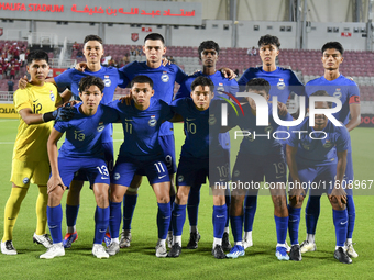 Singapore players pose for a team photo prior to the 2025 AFC U20 Asian Cup Qualifiers Group J match between Qatar and Singapore at Abdullah...