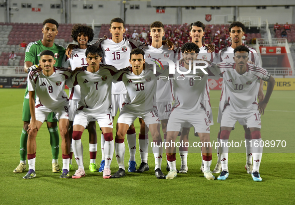 Qatar players pose for a team photo prior to the 2025 AFC U20 Asian Cup Qualifiers Group J match between Qatar and Singapore at Abdullah bin...