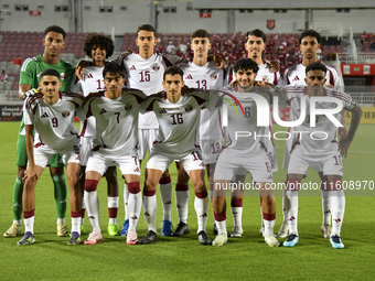 Qatar players pose for a team photo prior to the 2025 AFC U20 Asian Cup Qualifiers Group J match between Qatar and Singapore at Abdullah bin...