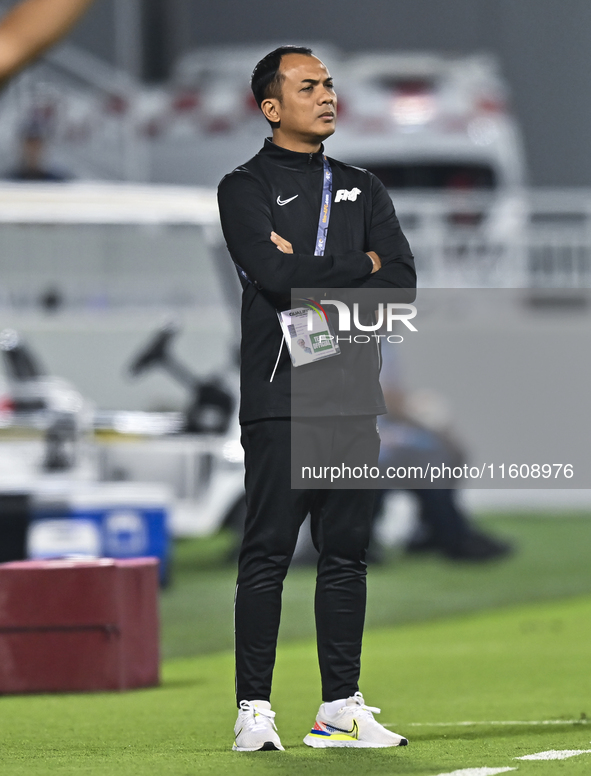 Mohamed Fadzuhasny, Head Coach of Singapore, reacts during the 2025 AFC U20 Asian Cup Qualifiers Group J match between Qatar and Singapore a...