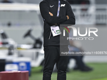 Mohamed Fadzuhasny, Head Coach of Singapore, reacts during the 2025 AFC U20 Asian Cup Qualifiers Group J match between Qatar and Singapore a...