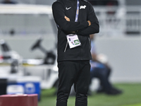 Mohamed Fadzuhasny, Head Coach of Singapore, reacts during the 2025 AFC U20 Asian Cup Qualifiers Group J match between Qatar and Singapore a...