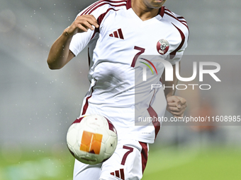 Tahsin Mohammed Jamshid of Qatar plays during the 2025 AFC U20 Asian Cup Qualifiers Group J match between Qatar and Singapore at Abdullah bi...