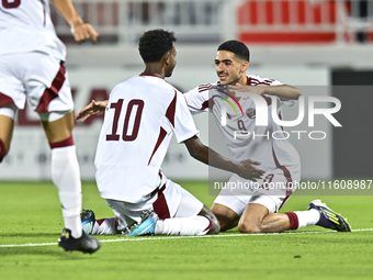 Ibrahim Mohammadali of Qatar celebrates after scoring the opening goal during the 2025 AFC U20 Asian Cup Qualifiers Group J match between Qa...