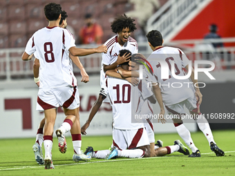 Ibrahim Mohammadali (#10) of Qatar celebrates after scoring the opening goal during the 2025 AFC U20 Asian Cup Qualifiers Group J match betw...