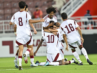 Ibrahim Mohammadali (#10) of Qatar celebrates after scoring the opening goal during the 2025 AFC U20 Asian Cup Qualifiers Group J match betw...