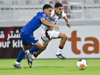 Mohamed Khaled Gouda (R) of Qatar battles for the ball with Fairuz Fazli (L) of Singapore during the 2025 AFC U20 Asian Cup Qualifiers Group...