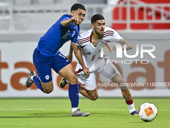 Mohamed Khaled Gouda (R) of Qatar battles for the ball with Fairuz Fazli (L) of Singapore during the 2025 AFC U20 Asian Cup Qualifiers Group...