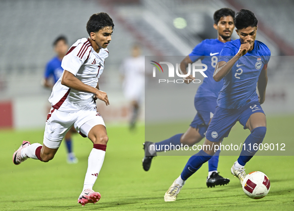 Tahsin Mohammed Jamshid (L) of Qatar battles for the ball with Raoul Suhaimi (R) of Singapore during the 2025 AFC U20 Asian Cup Qualifiers G...