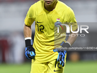 Muhammad 'Rauf Erwan of Singapore plays during the 2025 AFC U20 Asian Cup Qualifiers Group J match between Qatar and Singapore at Abdullah b...