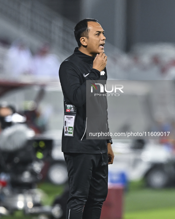 Mohamed Fadzuhasny, Head Coach of Singapore, reacts during the 2025 AFC U20 Asian Cup Qualifiers Group J match between Qatar and Singapore a...