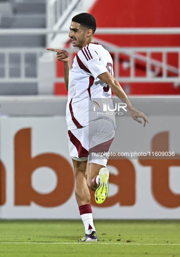 Mohamed Khaled Gouda of Qatar celebrates after scoring the goal during the 2025 AFC U20 Asian Cup Qualifiers Group J match between Qatar and...