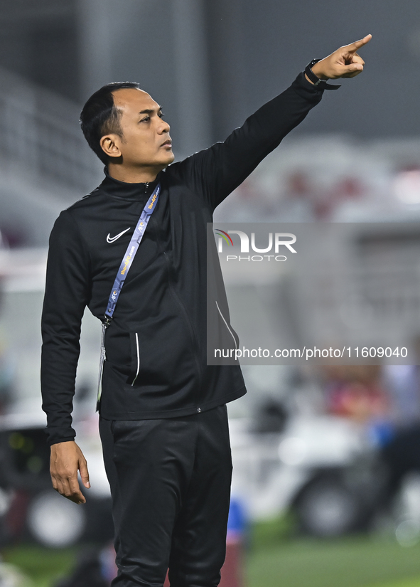 Mohamed Fadzuhasny, Head Coach of Singapore, reacts during the 2025 AFC U20 Asian Cup Qualifiers Group J match between Qatar and Singapore a...