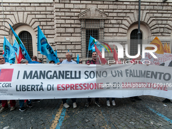 The CGIL and UIL unions, two of the main unions in the country, protest in Rome, Italy, on September 25, 2024, against a bill by the far-rig...