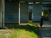 Graffiti calling for the return of Israeli hostages held by Hamas militants is seen painted on structures in Warsaw, Poland on 25 September,...