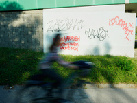 Graffiti calling for the return of Israeli hostages held by Hamas militants is seen painted on structures in Warsaw, Poland on 25 September,...