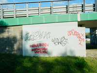 Graffiti calling for the return of Israeli hostages held by Hamas militants is seen painted on structures in Warsaw, Poland on 25 September,...