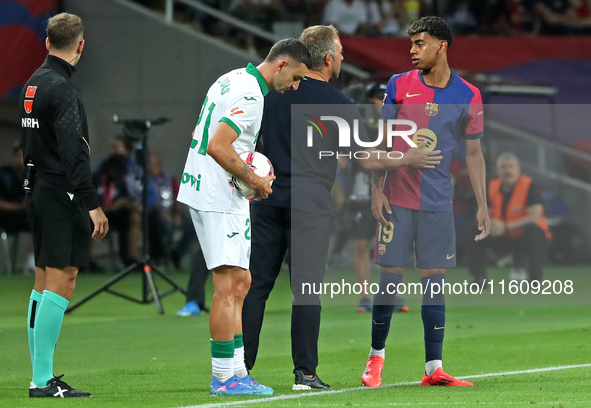 Hansi Flick and Lamine Yamal during the match between FC Barcelona and Getafe CF, corresponding to week 7 of LaLiga EA Sports, at the Lluis...