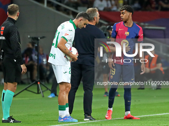 Hansi Flick and Lamine Yamal during the match between FC Barcelona and Getafe CF, corresponding to week 7 of LaLiga EA Sports, at the Lluis...