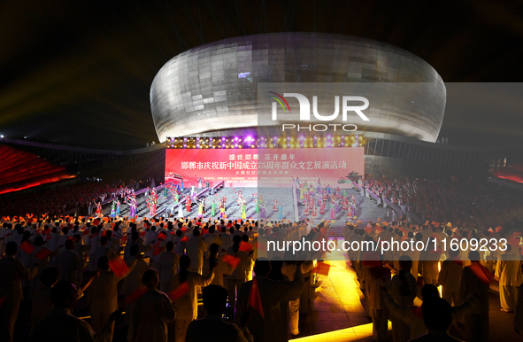 A mass performance celebrates the 75th anniversary of the founding of New China in Handan, China, on September 25, 2024. 