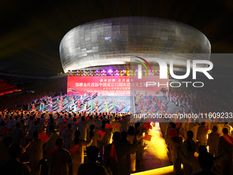 A mass performance celebrates the 75th anniversary of the founding of New China in Handan, China, on September 25, 2024. (